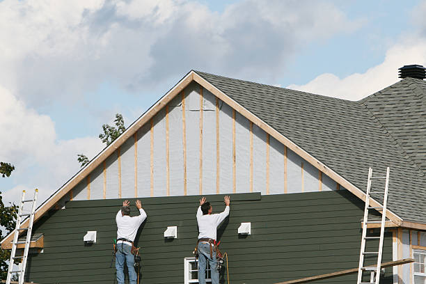 Professional Storm Damage Siding Repair technician working in Linwood, NC